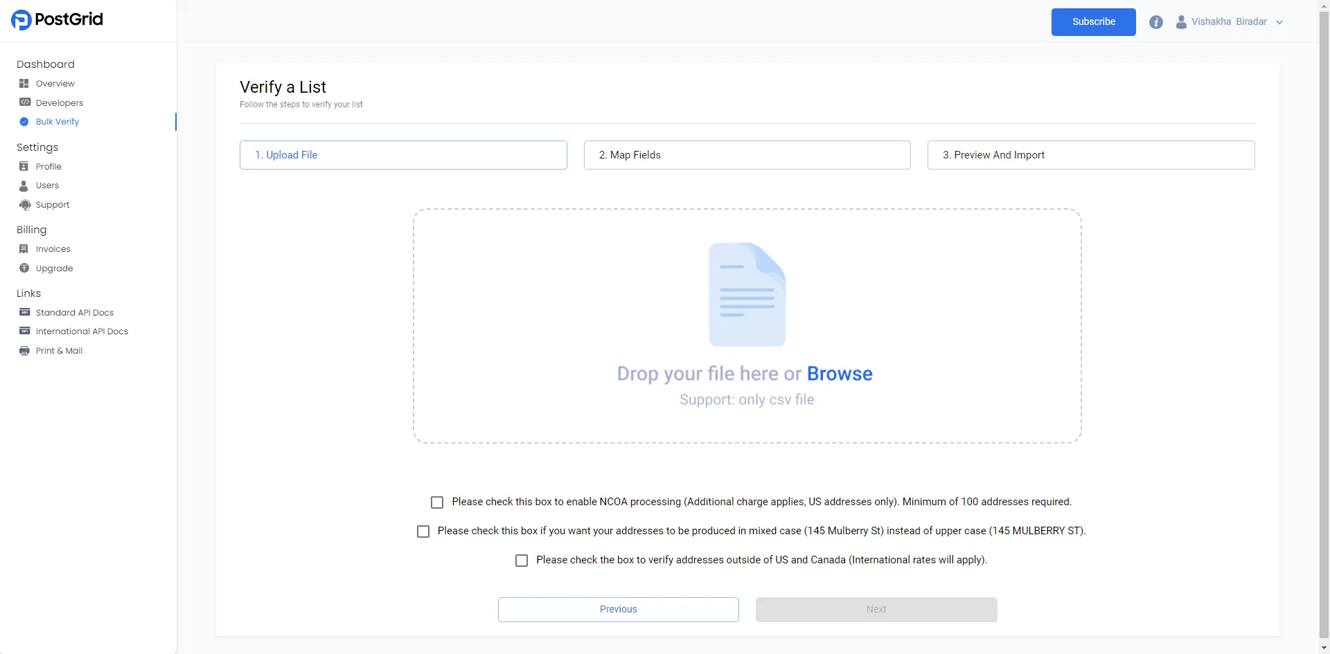 PostGrid bulk verification upload page with an Upload button and checkboxes for international addresses and NCOA service