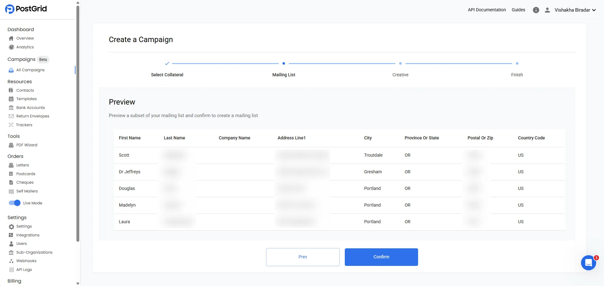 Mailing list preview table showing recipient columns including name, address fields, and country before confirmation